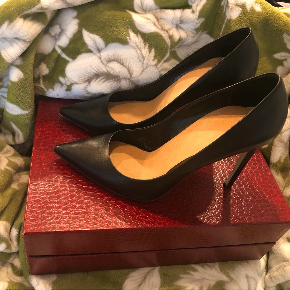 Italian black leather 4 inch Tamara Mellon pumps.